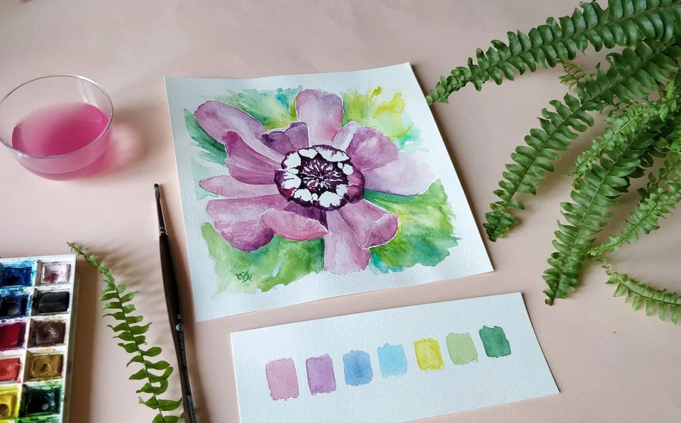 Acquerello di un fiore viola con centro scuro su fondo verde